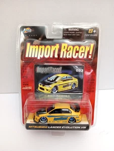1:64 Jada Import Racer Mitsubishi Lancer Evolution VIII Yellow - Picture 1 of 2