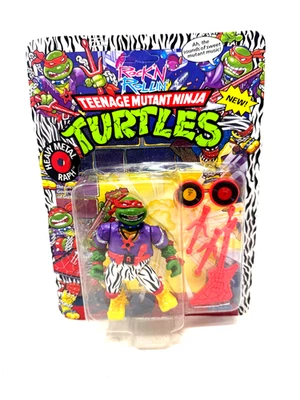 Figura sellada Playmates 1991 TMNT Ninja Turtles Heavy Metal Raph Foto 1 de 4