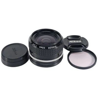 Lente de enfoque manual Nikon NIKKOR 28 mm f/2,8 AI • Bueno • Rasguños traseros, tapas con filtro Foto 1 de 4