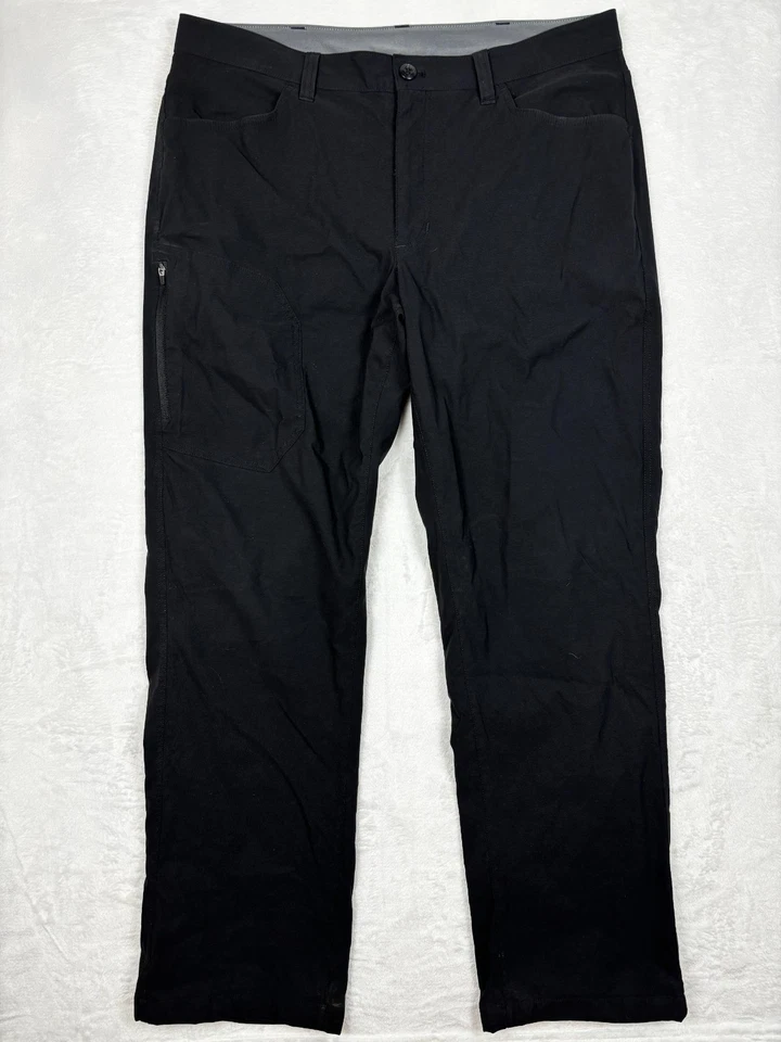 Pantalones tecnológicos forrados de lana Eddie Bauer para hombre 36x32 negros senderismo elásticos de nailon Foto 1 de 4