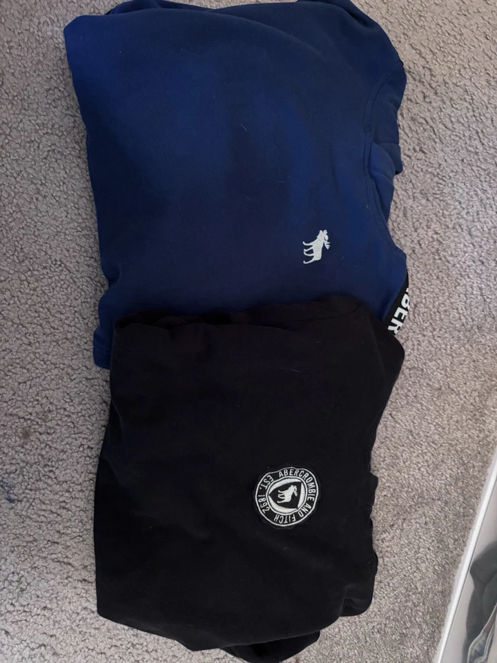 Lote de 2 sudaderas con capucha para niños Abercrombie talla 13/14 - azul real y negro Foto 1 de 4