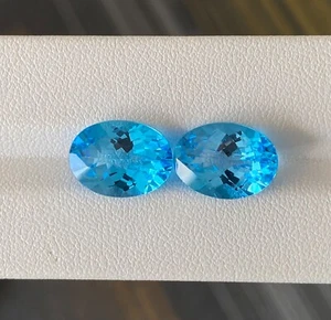 14.00 Top Luster Oval Checker Cut Pair Natural Swiss Blue Topaz - 10x14 mm Video - Picture 1 of 3