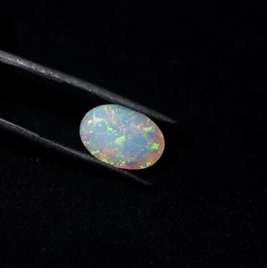 5.1 Cts 15.2x10.6 MM Natural AAA Green Yellow Red Fire Ethiopian Opal Oval Cut - Picture 1 of 9