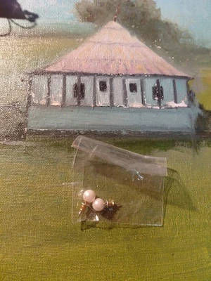 par de pendientes de perlas Claires Foto 1 de 4