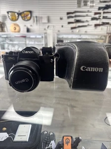 Canon F-1 analoge Spiegelreflexkamera 35 mm mit Objektiv 50 mm f1,4 & Blitzkoppler - Bild 1 von 9