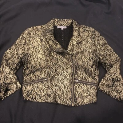 Chaqueta corta Umgee negra metálica dorada de encaje para moto talla S basculante asimétrica con cremallera Foto 1 de 4