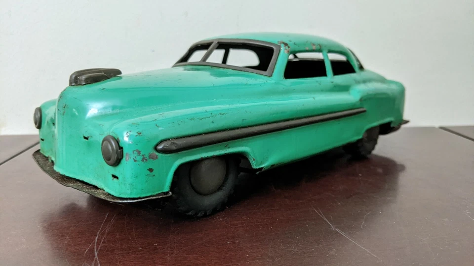 Coche de juguete vintage 1949 Tin Friction Cadillac cupé metal verde promoción ¡ULTRA RARO! Foto 1 de 4