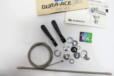 Juego de palanca de cambios Shimano Dura-Ace EX NUEVO DE STOCK negro en paquete para cable japonés Bosses de 4,5 mm Foto 1 de 4