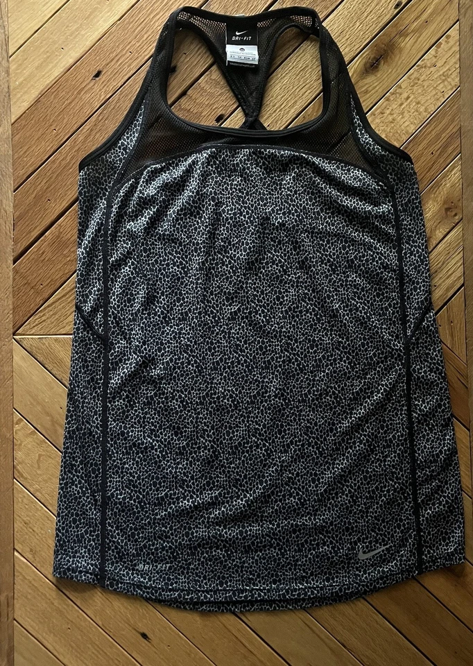 Camiseta sin mangas Nike Dri Fit para mujer X-Small negra blanca con estampado de animales espalda deportiva Foto 1 de 4