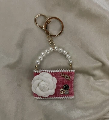 Bolso Dije Llavero Oro Tweed Rosa Cartera Perla Suerte Corazón 5 Símbolos Estrás Foto 1 de 2