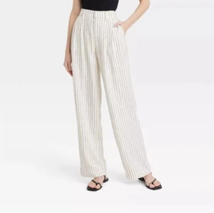 Women's High-Rise Linen Pleat Front Straight Trousers - A New Day - Cream/Black - Picture 1 of 21