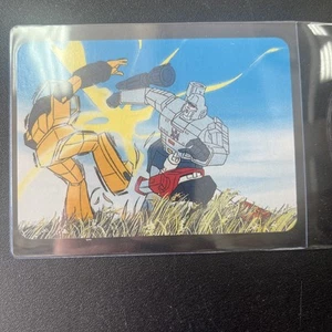 1985 Hasbro Transformers Series 1 trading card 174 Megatron Overpowers Sunstreak - Picture 1 of 2
