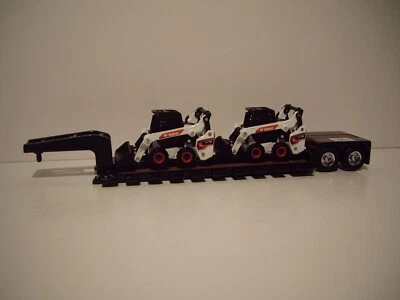ERTL 1/64 BLACK TANDEM AXLE LOWBOY AND 2 S76 BOBCAT LOAD SAME SCALE AS DCP - Image 1 of 4