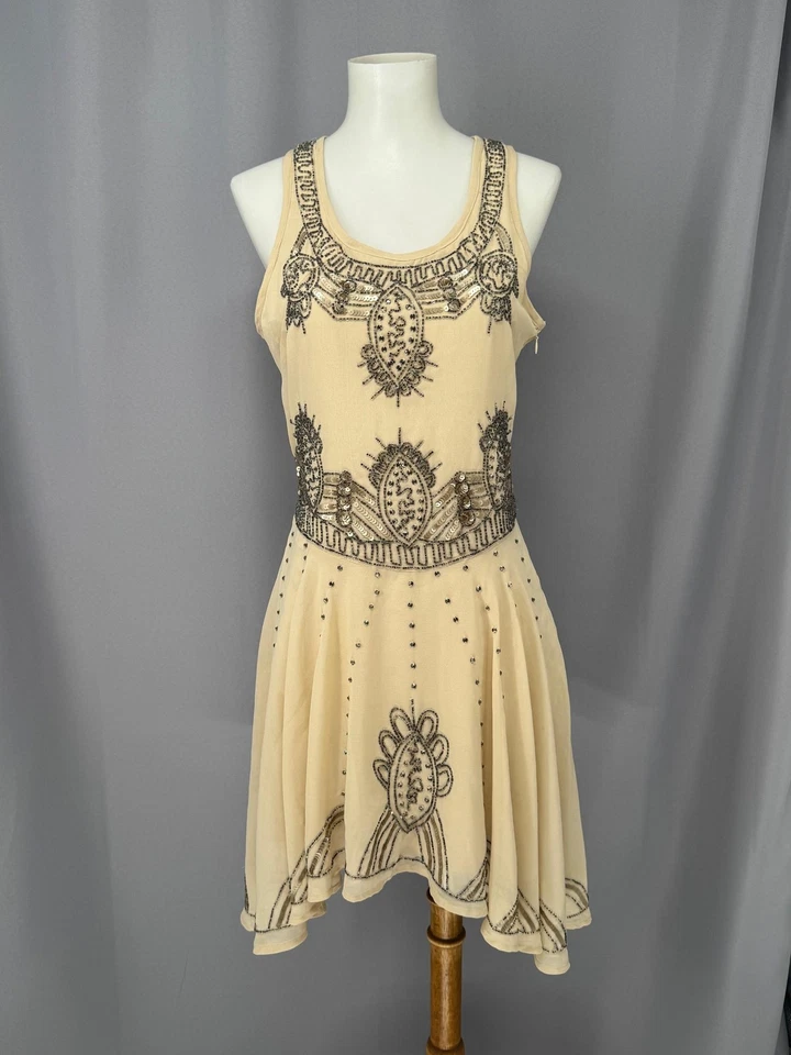 Vestido corto de fiesta Gatsby Art Deco con cuentas con solapa para mujer pequeño lentejuelas crema años 20 Foto 1 de 4