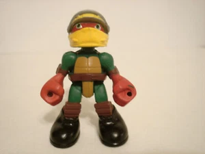 Teenage Mutant Ninja Turtles TMNT 2.5" Figura Raphael Casco de Carreras - Imagen 1 de 7