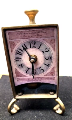 TIME WORLD QUARTZ BRASS DESK CLOCK WITH SWINGING PENDULUM - Image 1 of 2