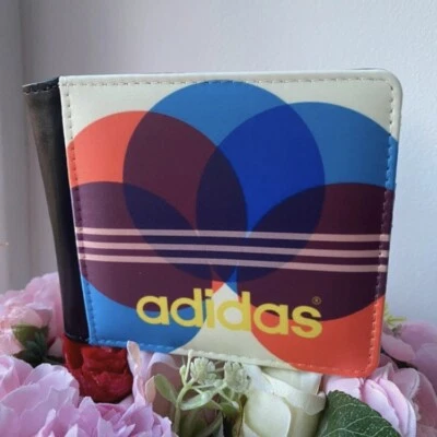 Cartera Adidas diseño circular para hombre Foto 1 de 3
