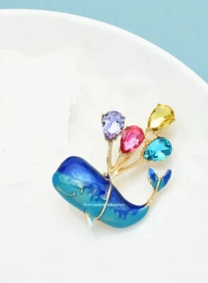 Broche prendedor con estrás de cristal paseo en globo ballena con bolsa de lámina dorada - VIDEO Foto 1 de 4