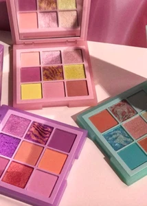 Paleta de mini sombras de ojos pastel Huda Beauty Obsessions elige 1 nuevo auténtico - Imagen 1 de 1