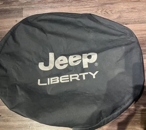 Jeep Liberty 02-07 OEM Full Sized Spare Tire Cover Black w/Logo - Picture 1 of 8