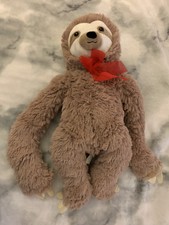 Stuffed “hugging” Sloth With Red Bow And Velcro Gripping Arms 