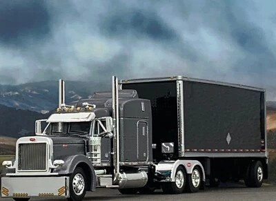 1/64 DCP PETERBILT 379 63" MID ROOF W/ 28' WABASH PUP TRAILER - Image 1 of 4