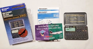Ancien organisateur électronique de poche SHARP ZQ-1200 34KB avec calculatrice - Photo 1 sur 8
