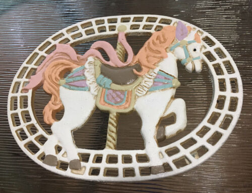Cast iron carousel trivet, colorfully painted, 7 inches wide