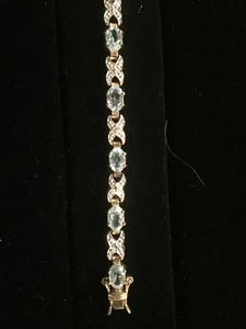 10k Over Sterling Tennis Bracelet Blue Topaz and Diamond - Picture 1 of 4