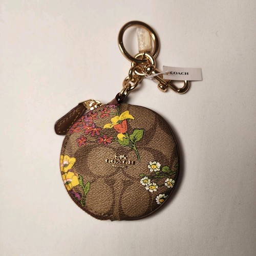 Portamonete circolare Coach CR501 nuovo con etichetta in tela firmato con stampa floreale