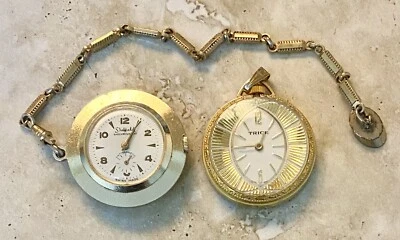 Lote de relojes de bolsillo vintage hechos en Suiza Sheffield Trice NO FUNCIONA Foto 1 de 4