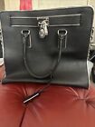 Michael Kors handbag, Black with silver accessories and silver stripe around 
