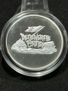 The Poured Corner Degenerate Pirates 1/2 Troy Ounce .999 Fine Silver Proof Round - Picture 1 of 2