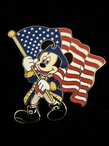 Disney pin Patriotic Mickey Mouse Colonial Dress Carrys USA Flag Red White Blue - Picture 1 of 2