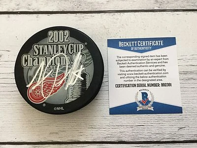 Luc Robitaille Firmado 2002 Red Wings Stanley Cup Hockey Puck Beckett BAS CERTIFICADO DE AUTENTICIDAD c Foto 1 de 3