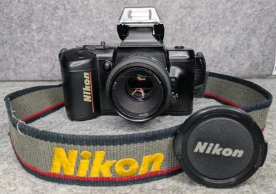 Cámara fotográfica Nikon N4004 35 mm SLR con lente y correa AF Nikkor 50 mm f/1,8 - Probada Foto 1 de 4