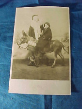 Early 20thc SANTA CLAUS w GIRL RIDING a DONKEY Christmas REAL PHOTO POSTCARD