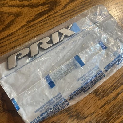 全新 原始设备制造商 Driftwood Pontiac Grand "PRIX" 铭牌徽章 10442392 A1 — 第 1/4 张图片