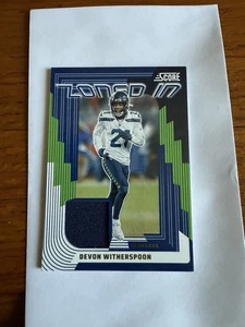 2025 Score Football - Devon Witherspoon #ZON-DWN - Zoned In - Memorabilia Patch - Picture 1 of 2