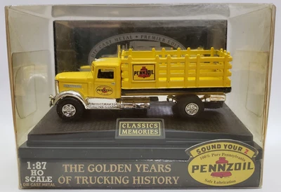 Camión con plataforma de estacas Golden Wheel Peterbilt 260 Pennzoil diecast escala 1:87 HO amarillo Foto 1 de 4
