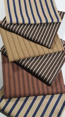 Antiguo lote de chatarra de tela edredón muñeca a rayas marrones pan de jengibre vintage Foto 1 de 3