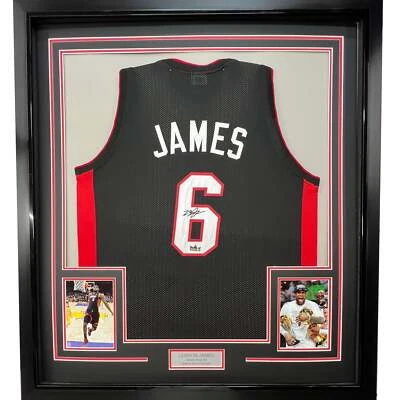 Framed Facsimile Autographed LeBron James 33x42 Black Reprint Laser Auto Jersey - Image 1 of 2