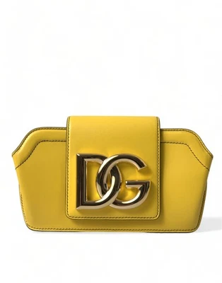 BOLSO BANDOLERA CLUTCH DE CUERO LISO AMARILLO CON LOGO DG Foto 1 de 4