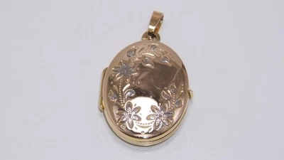 Hermoso medallón floral con bisagras ovaladas de oro amarillo y blanco de 9 quilates de 9 quilates 2 gms Foto 1 de 4