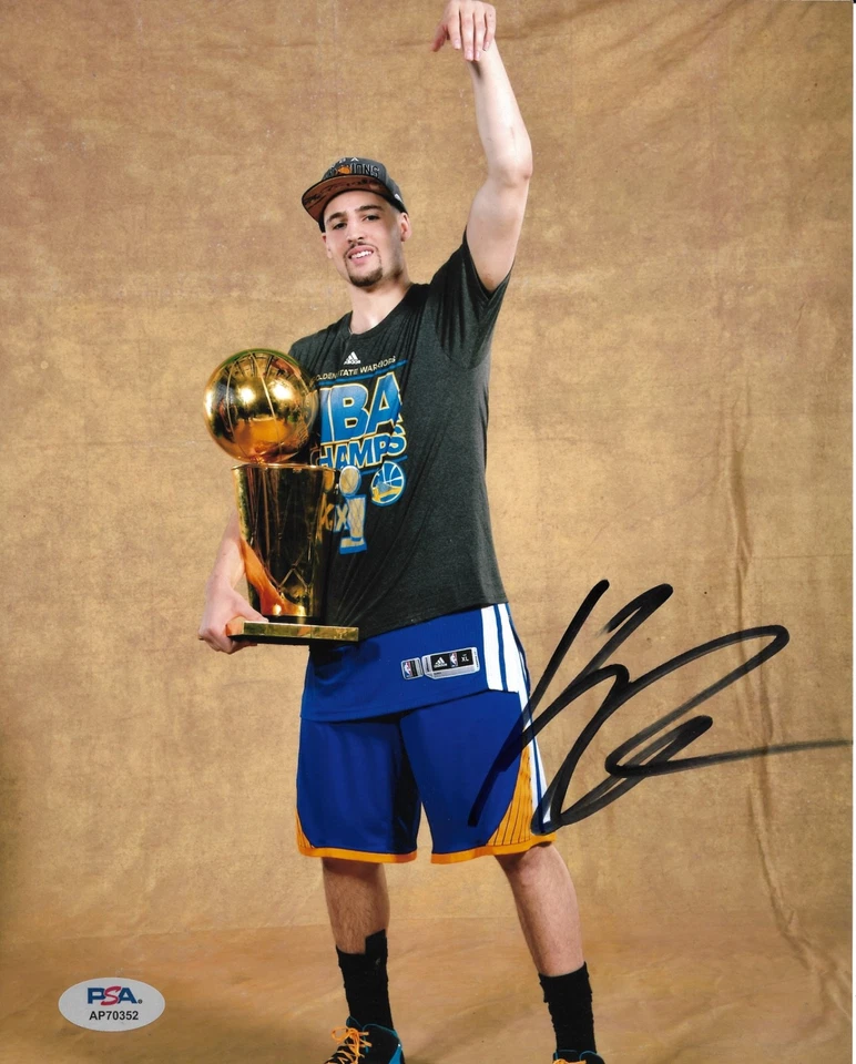 KLAY THOMPSON signed GOLDEN STATE WARRIORS TROPHY 8X10 photo w/ COA PSA AP70352 - Image 1 of 1