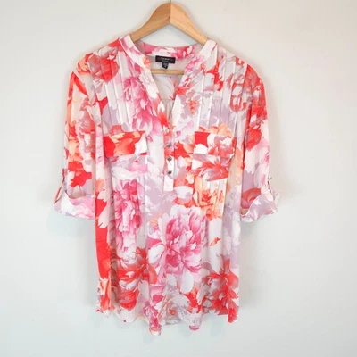 Blusa Pintuck para mujer Cocomo con estampado floral mangas enrollables talla 1X Foto 1 de 4