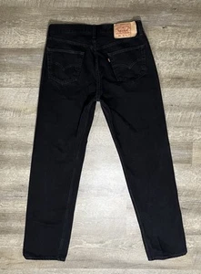 Jeans Levi’s 501 vintage anni 90 nero denim made in USA bottoni mosca taglia 36X34 - Foto 1 di 6