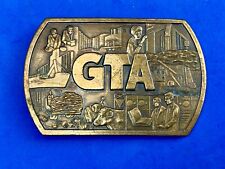 Vintage Promotional Company belt buckle. Gta equipment manufacturing