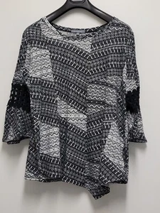 Top mujer colección NY boho asimétrico geométrico con cordones manga 3/4 - Imagen 1 de 14