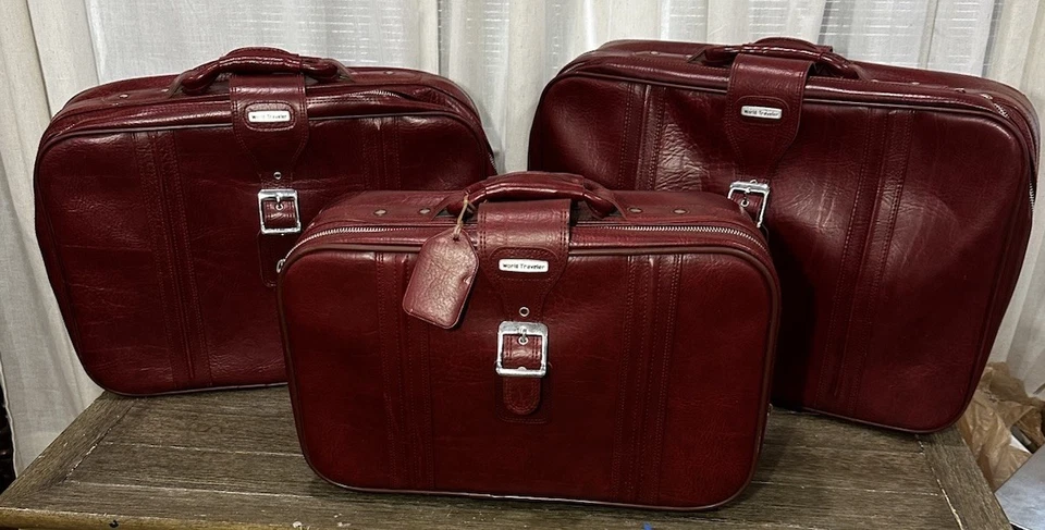 Vintage “World Traveler” faux leather luggage set 3 piece, Stackable - Image 1 of 4